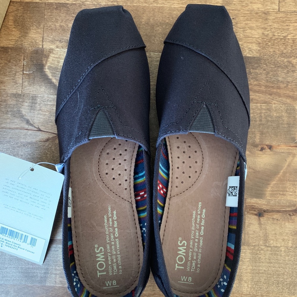 Brand new Toms